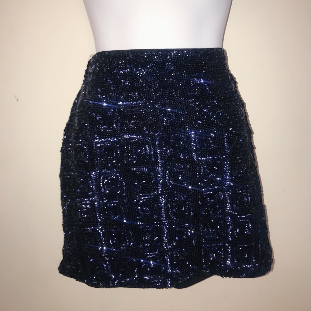 Sparkly sequined dark blue mini skirt.
